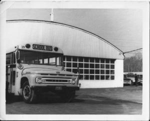 Bus in front of the garage